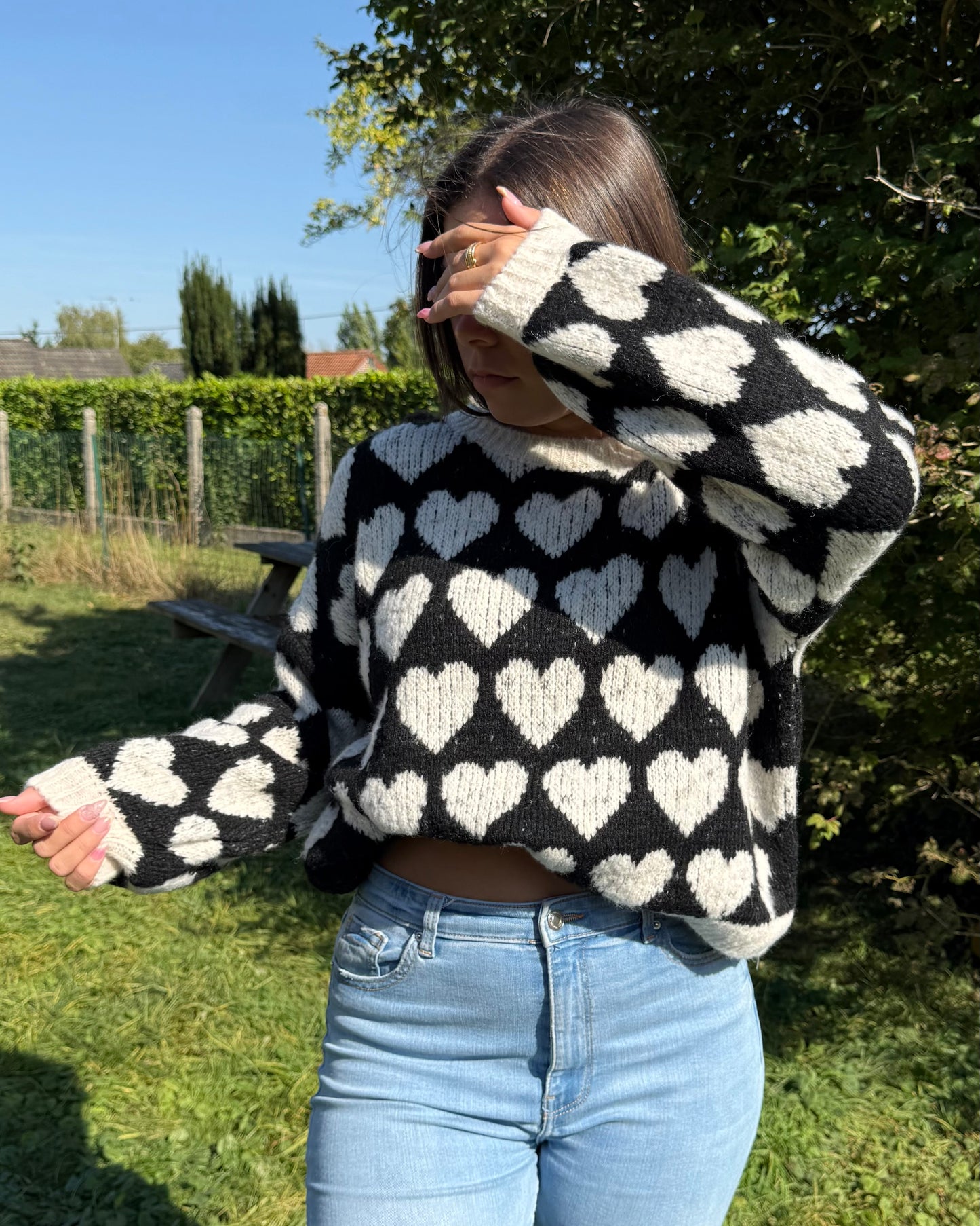Pull cœur noir réassort