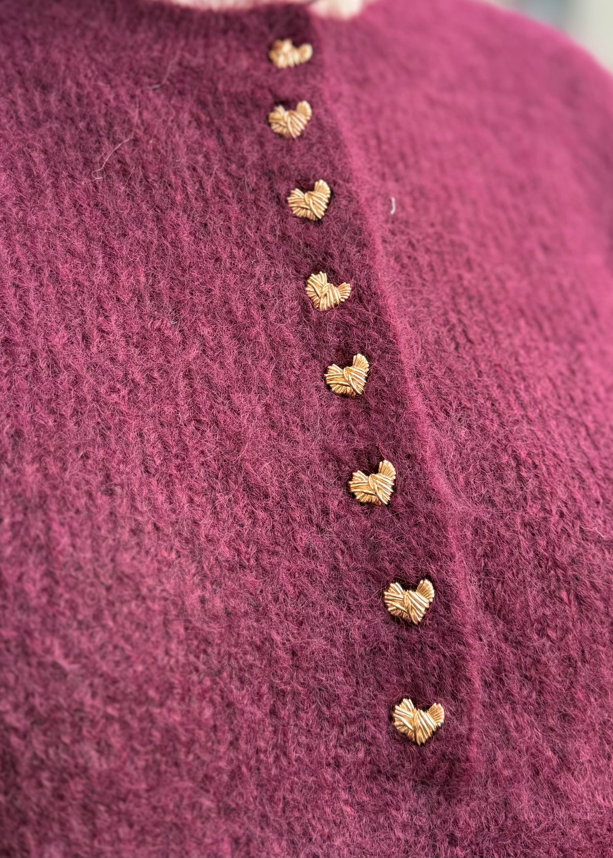 Pull bordeaux cœur doré