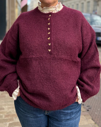 Pull bordeaux cœur doré