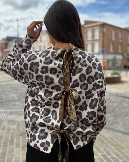 Pull léopard femme avec nœud doré en sequins dans le dos